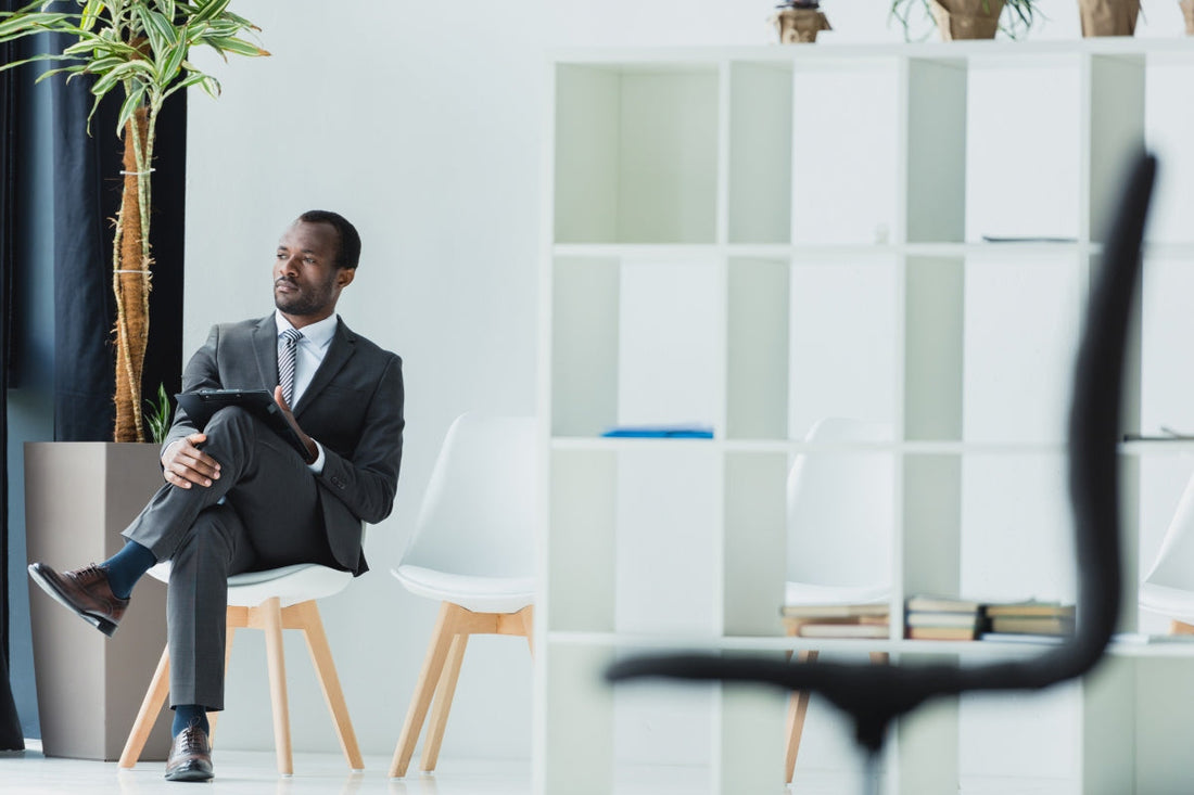 Office chairs with and without armrests comparison showing ergonomic features